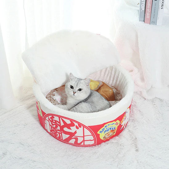 maison pour chat style japonais rond et profond et un chat qui est coucher dedans