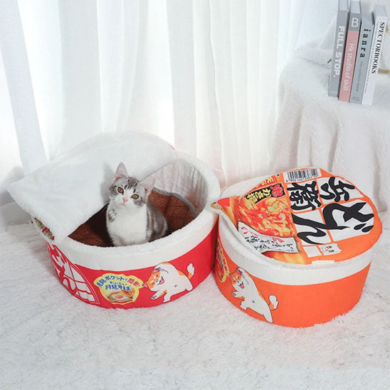 maison pour chat style japonais rouge et orange de forme ronde et profonde pour que les chats puissent se cachés